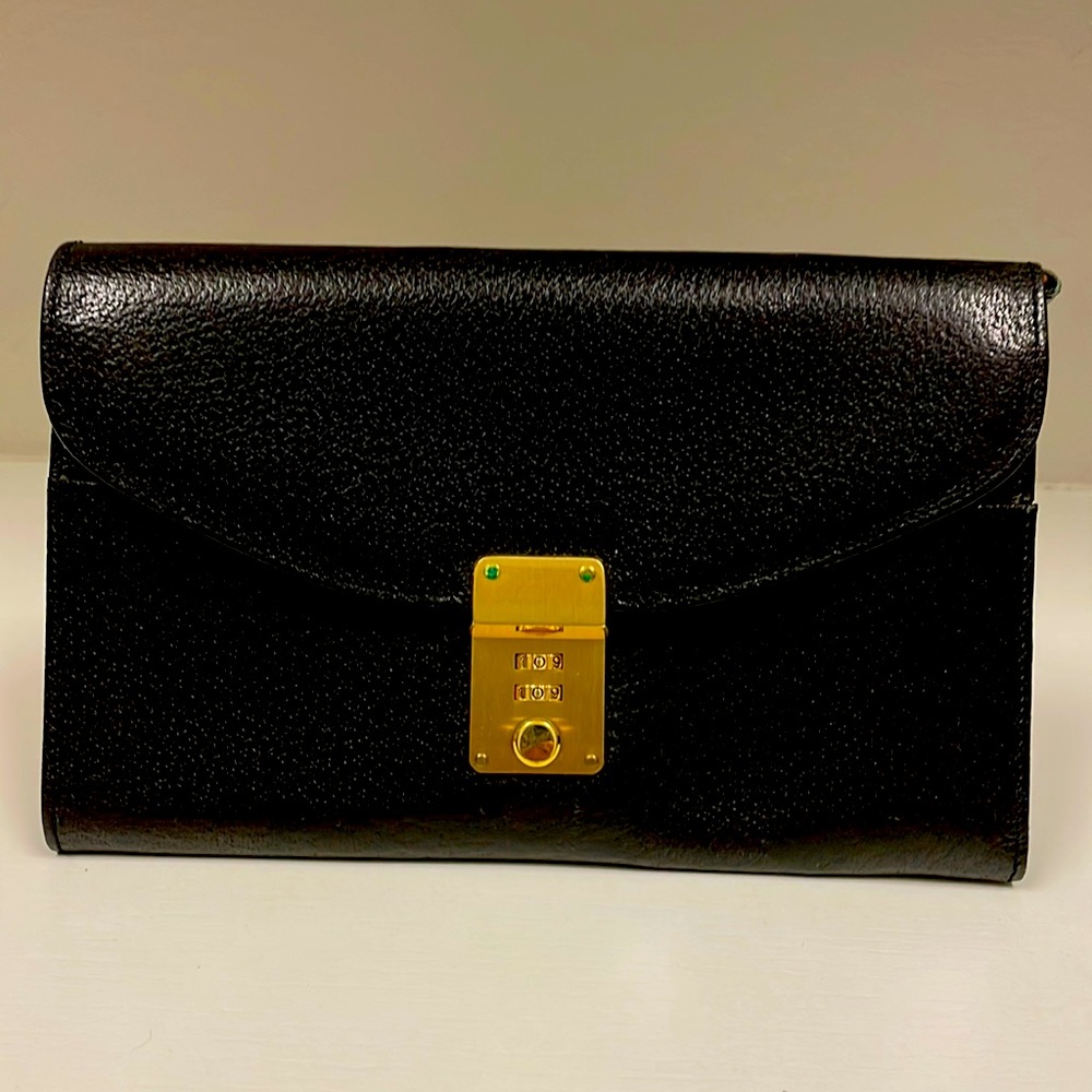 Smythson London black leather travel wallet.
